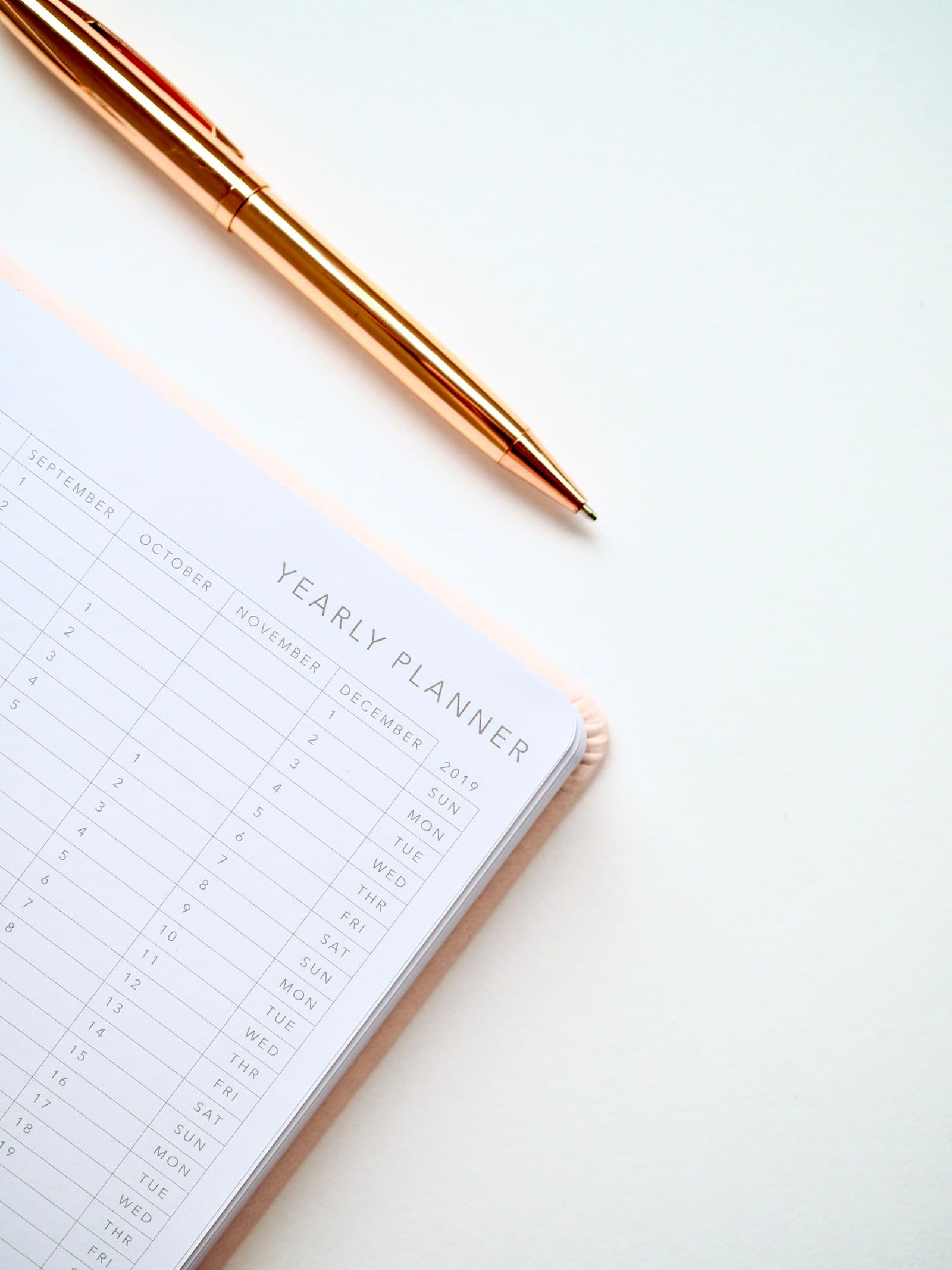 Printable expense tracker template on a paper planner