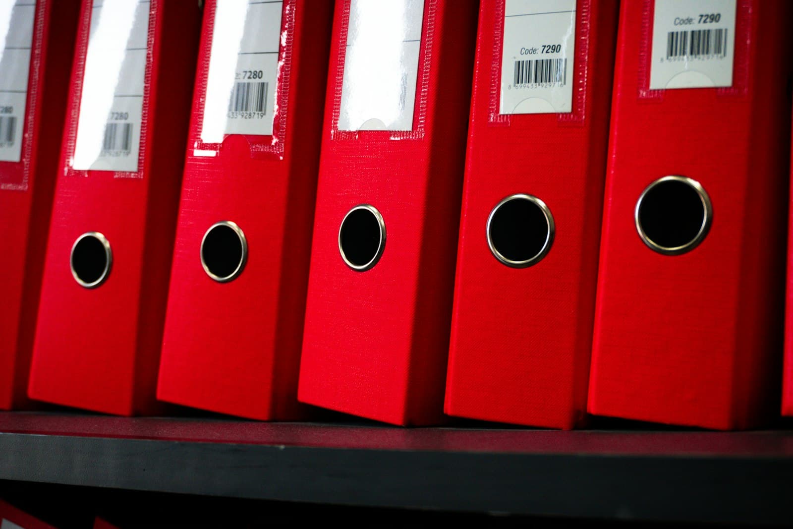 Neatly arranged file folders on a shelf, one way to organize receipts
